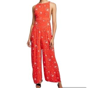 FREE PEOPLE red tie back floral jumpsuit